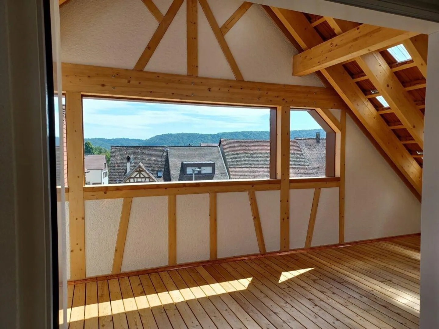 Appartement spacieux en attique dans une maison mitoyenne - Photo 7 sur 13