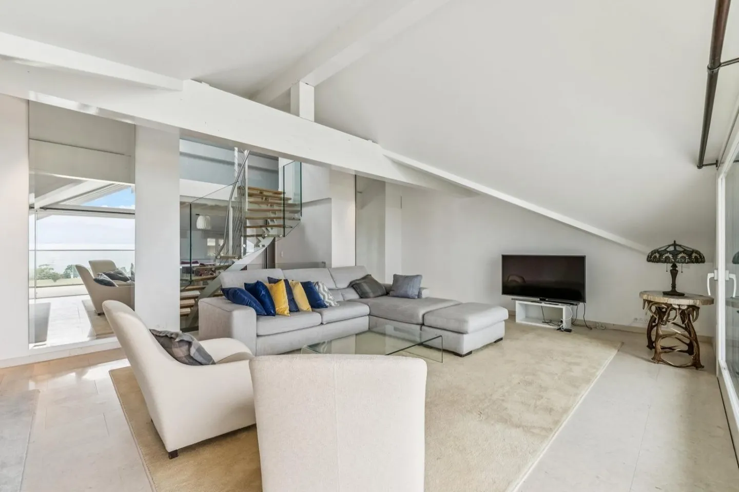 SUPERB DUPLEX WITH A VIEW OF THE LAKE - Photo 1 of 12