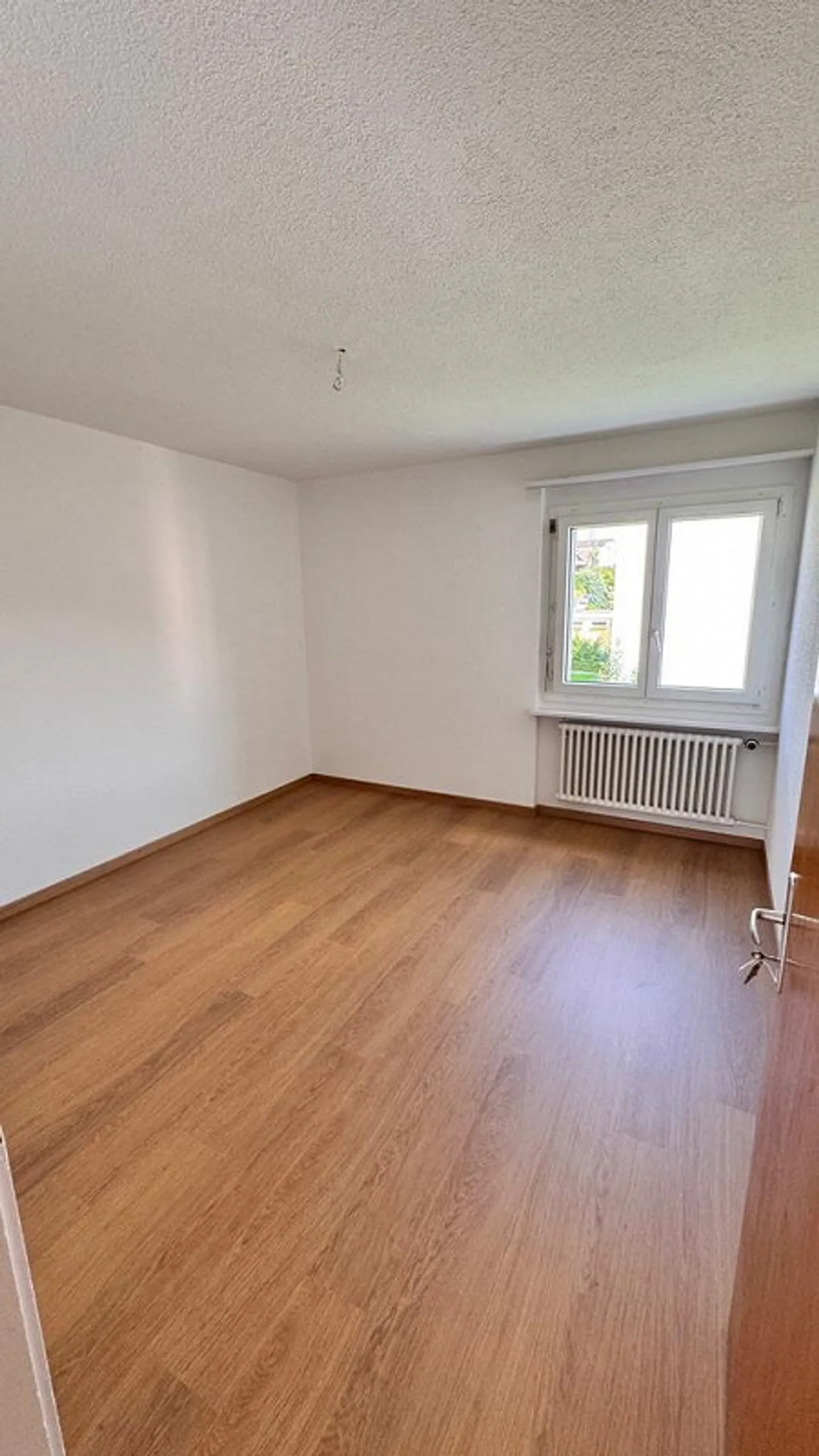Appartement 4.5 pièces dans un quartier résidentiel calme à Buchrain - Photo 9 sur 10