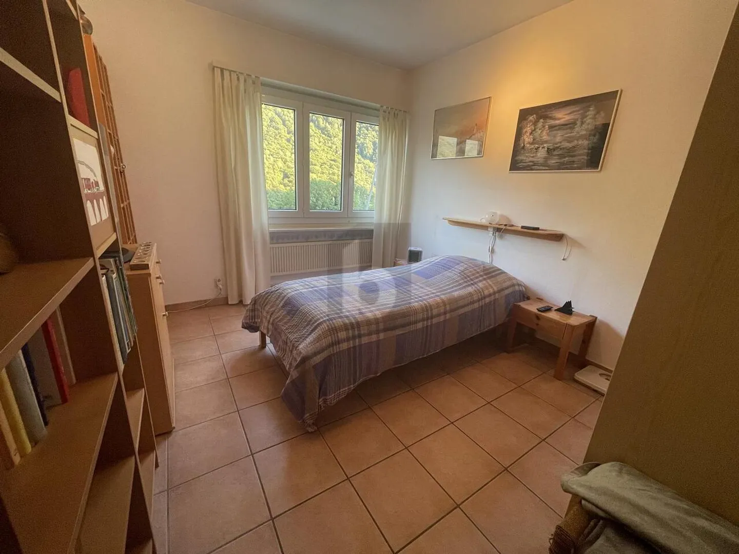 Geräumige Dachwohnung in Lumino - Foto 3 von 6