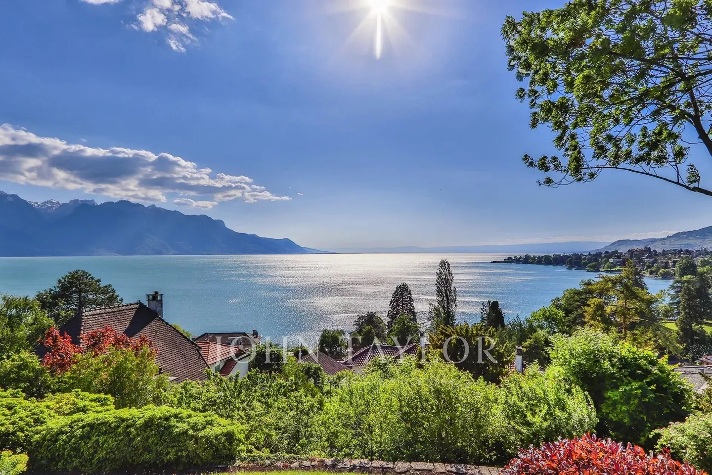 Propriété avec vue exceptionnelle sur le lac - Photo 3 sur 9