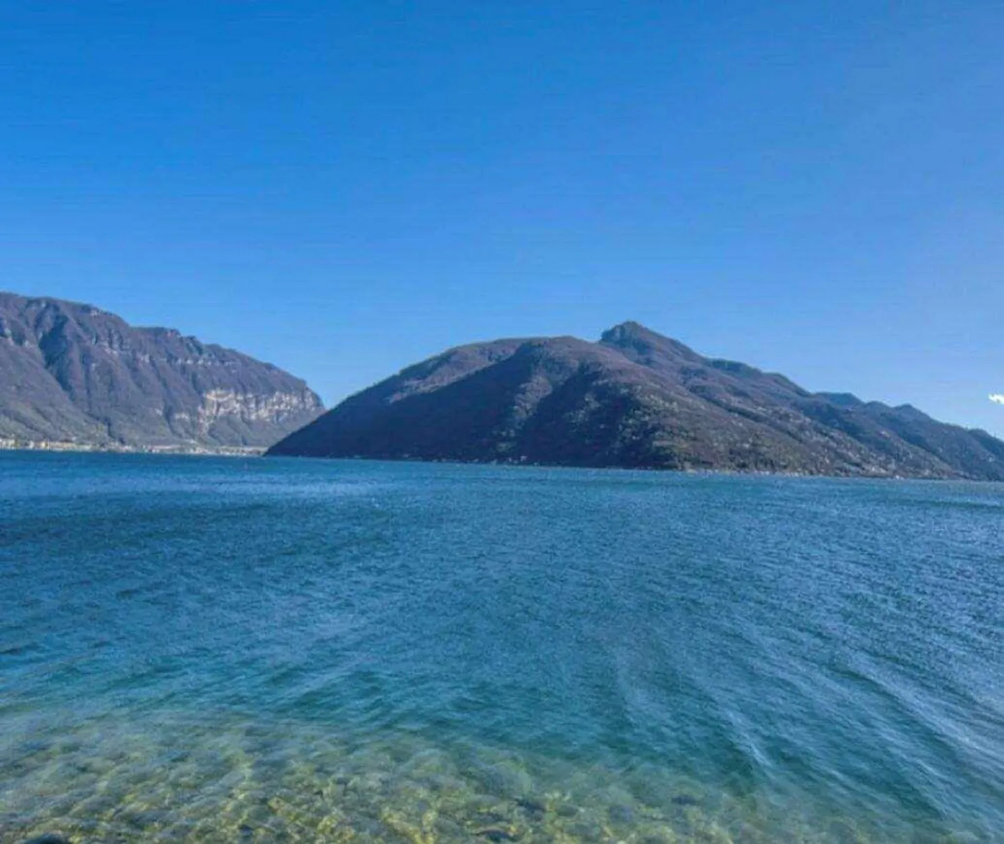Duplex all'ultimo piano con vista lago a Melide in vendita - Foto 1 di 1
