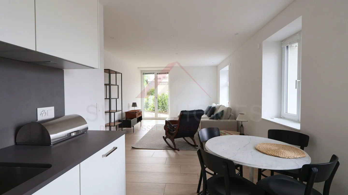 Kleines Juwel mit privatem Garten: 2,5 Zimmer, die Komfort, Ruhe und Intimität vereinen - Foto 3 von 8