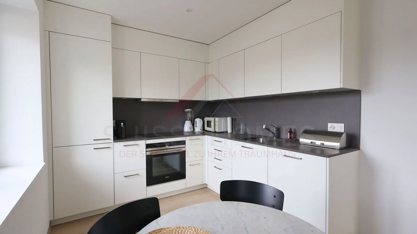 Kleines Juwel mit privatem Garten: 2,5 Zimmer, die Komfort, Ruhe und Intimität vereinen - Foto 4 von 8