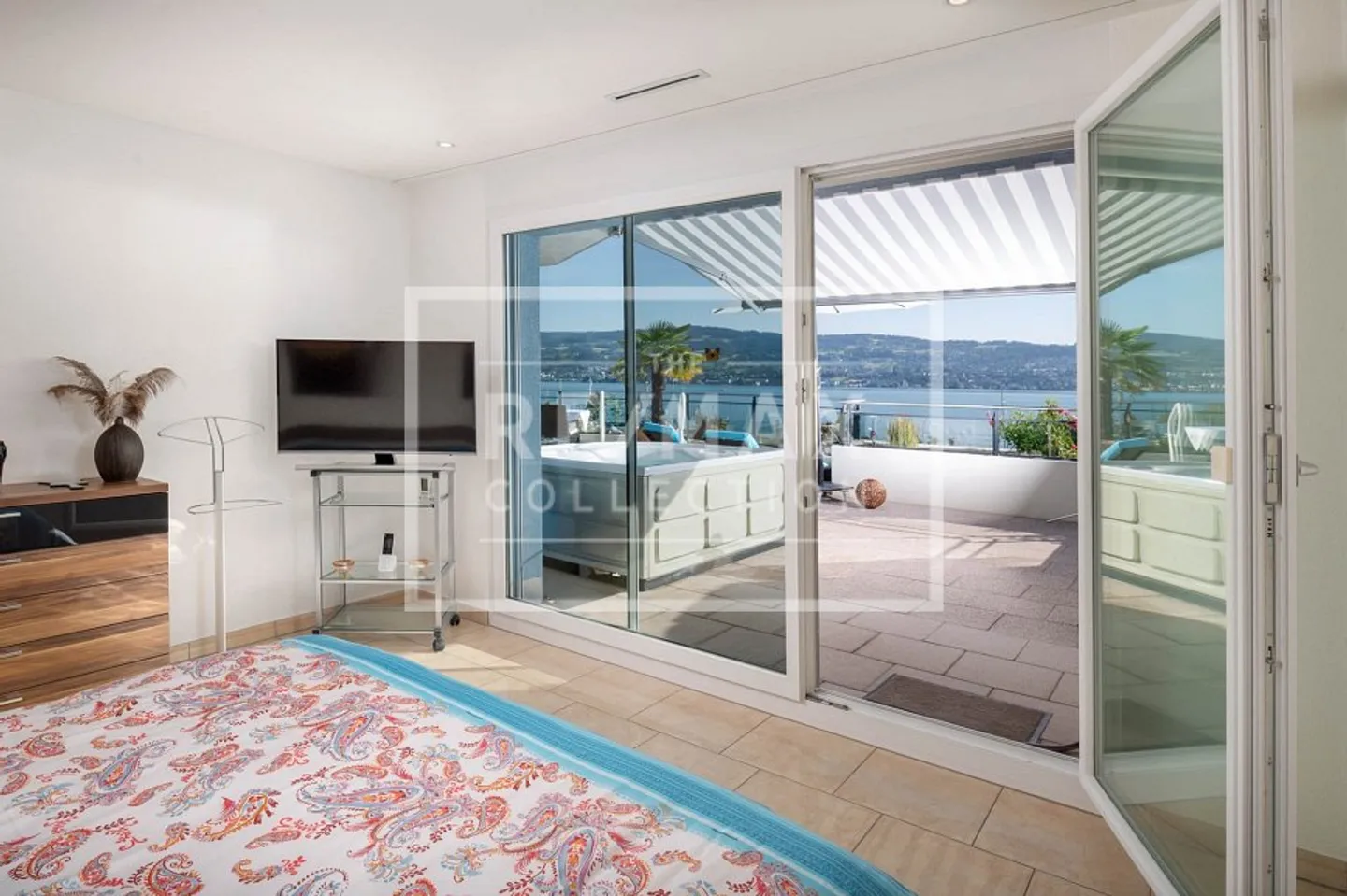 Appartamento terrazza unico di 4,5 stanze con vista lago e carattere benessere - Foto 10 di 13