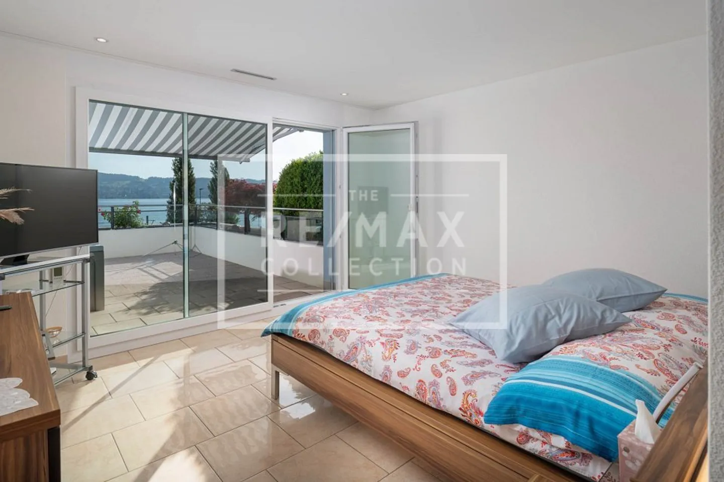Appartamento terrazza unico di 4,5 stanze con vista lago e carattere benessere - Foto 11 di 13
