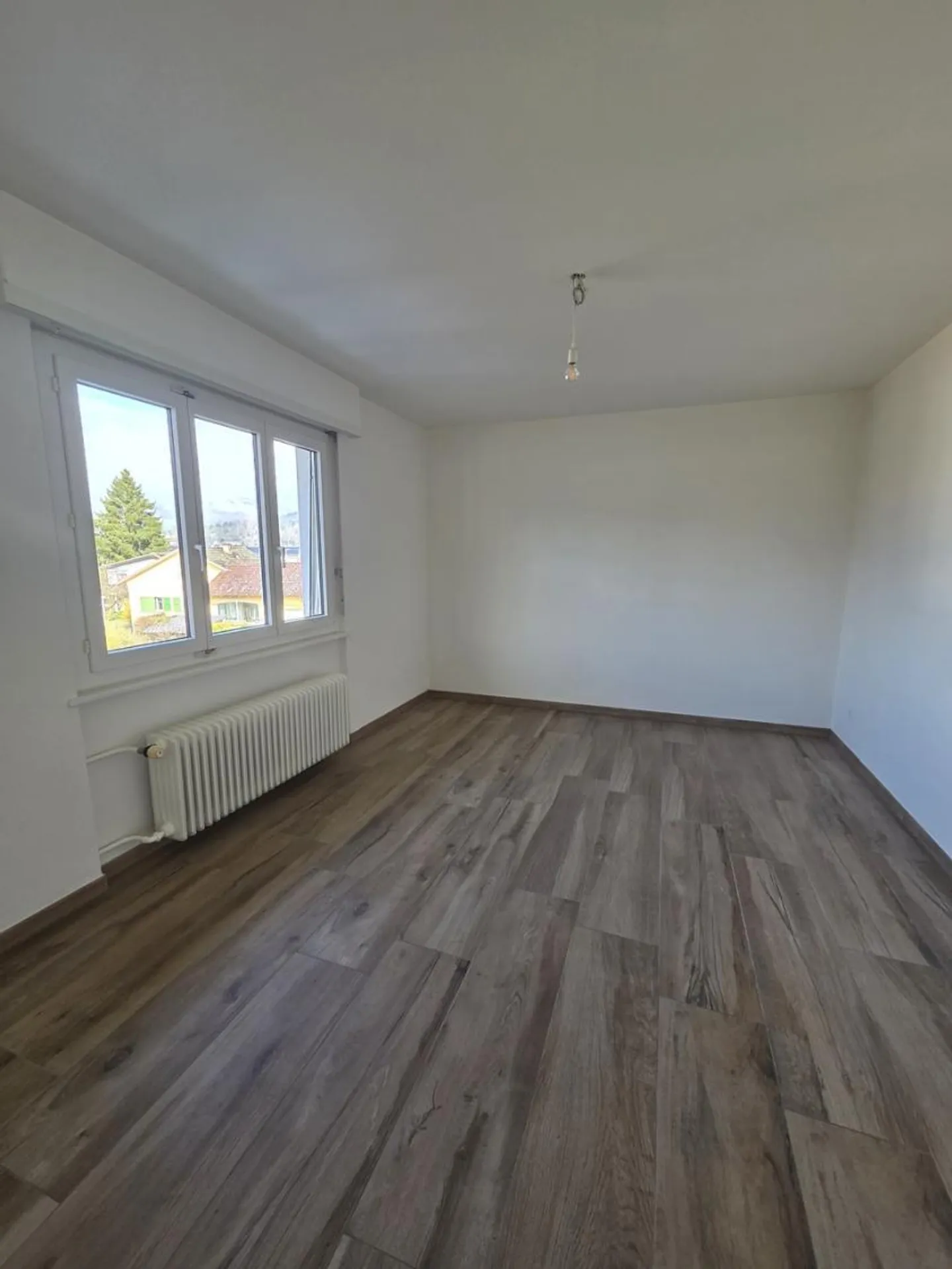 Appartement chaleureux 3 pièces - Photo 3 sur 6