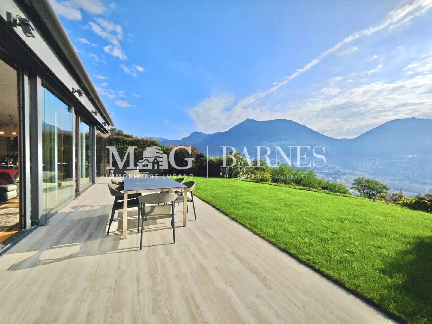 Lugano : Appartement 4.5 pièces avec terrasse et jardin vue sur le lac - Photo 3 sur 24
