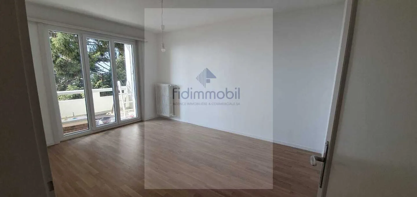 Spacious 5.5-room apartment with balcony and large garage - Photo 9 of 12