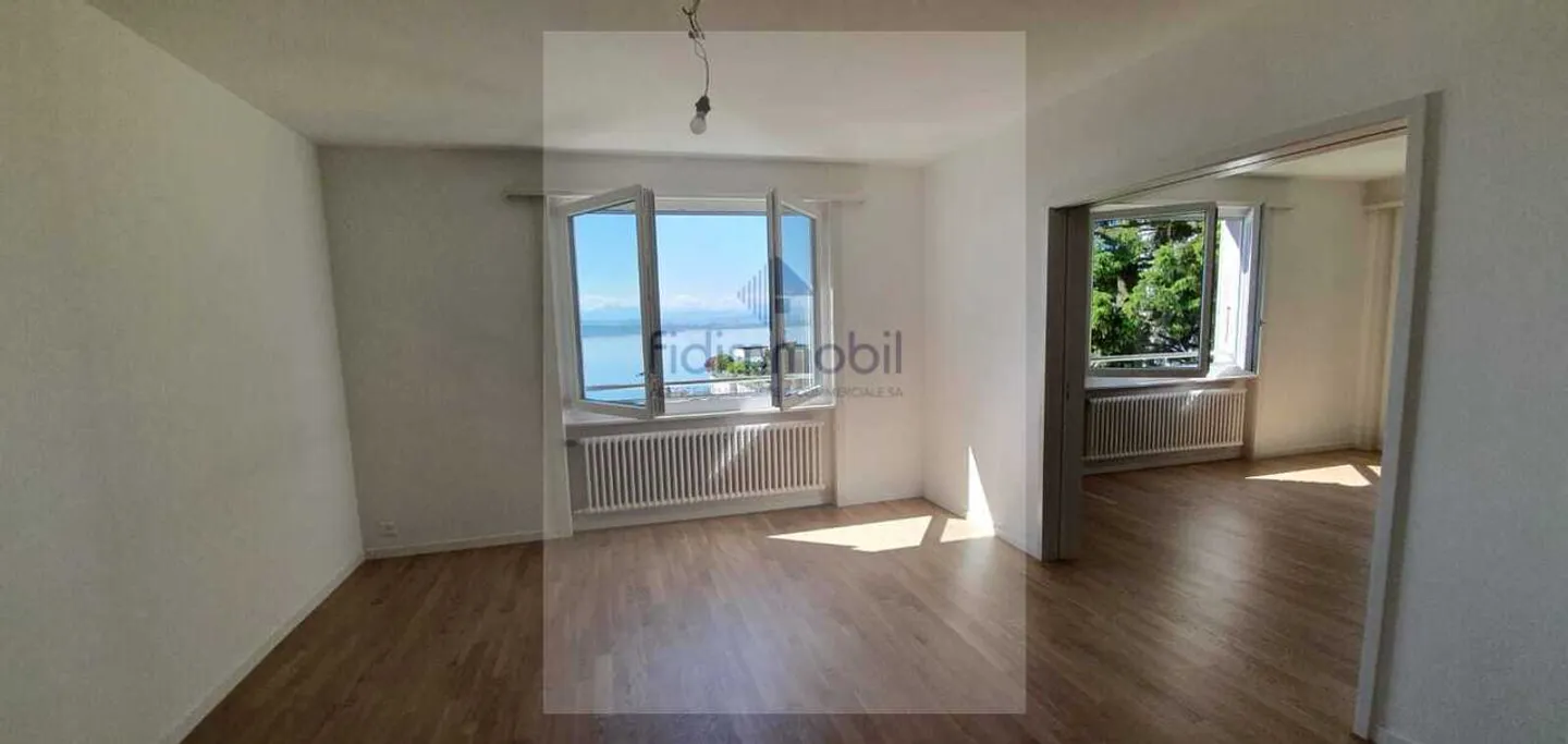 Spacious 5.5-room apartment with balcony and large garage - Photo 10 of 12