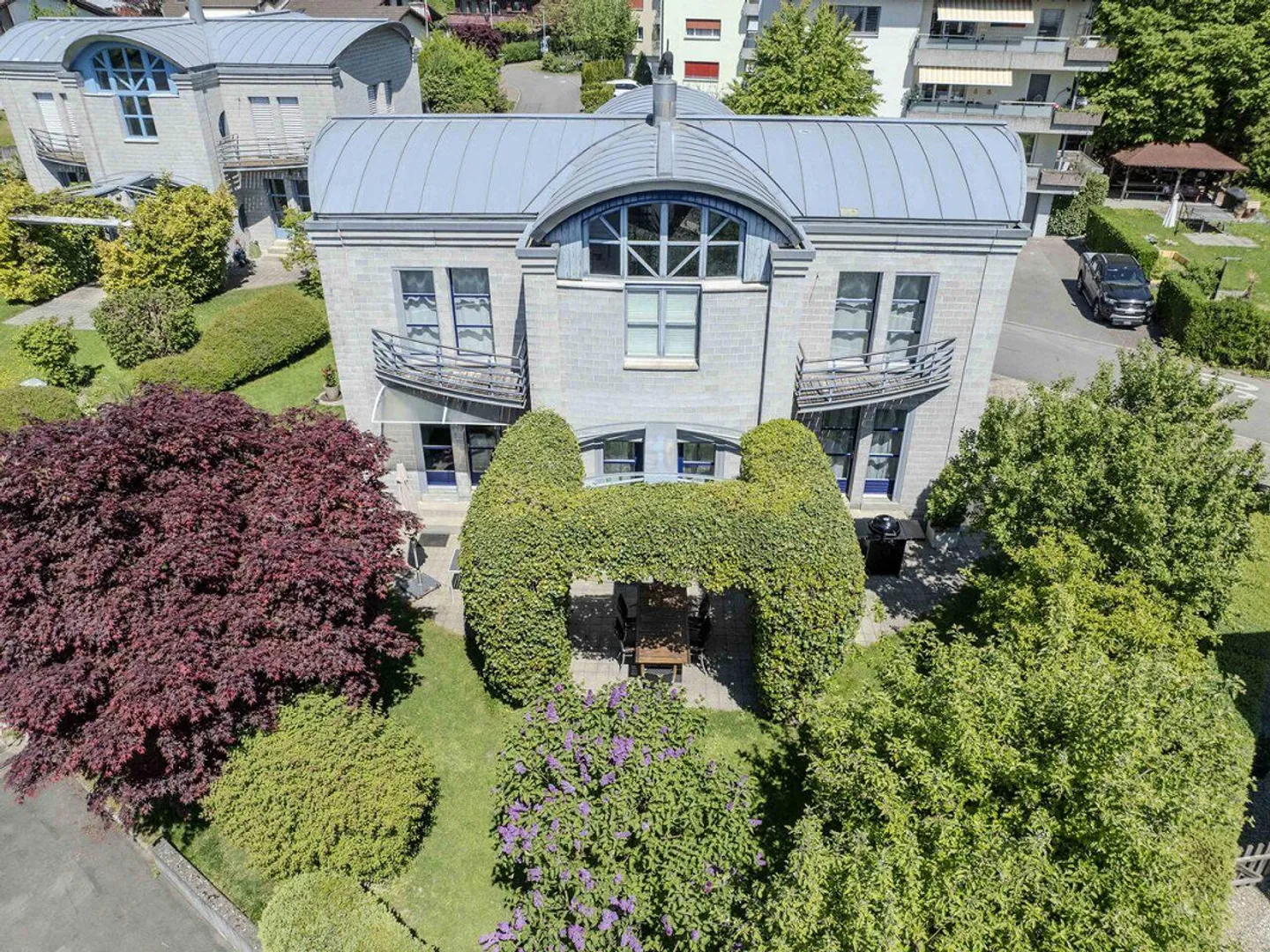 Casa unifamiliare con oasi di giardino - Foto 1 di 12