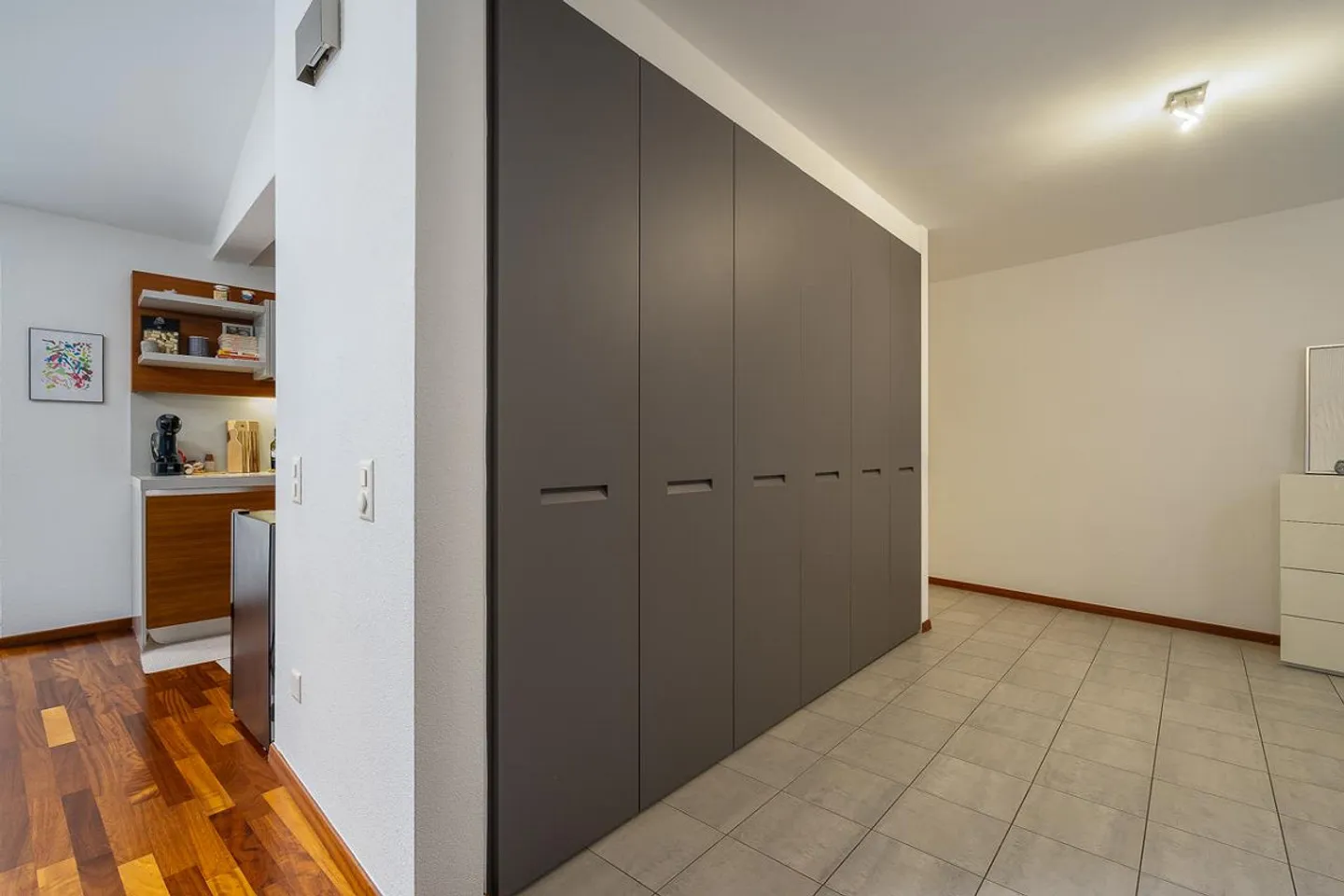 Exclusive Renovated Apartment with Private Garden in the Historic Heart of Caslano - Photo 6 of 13