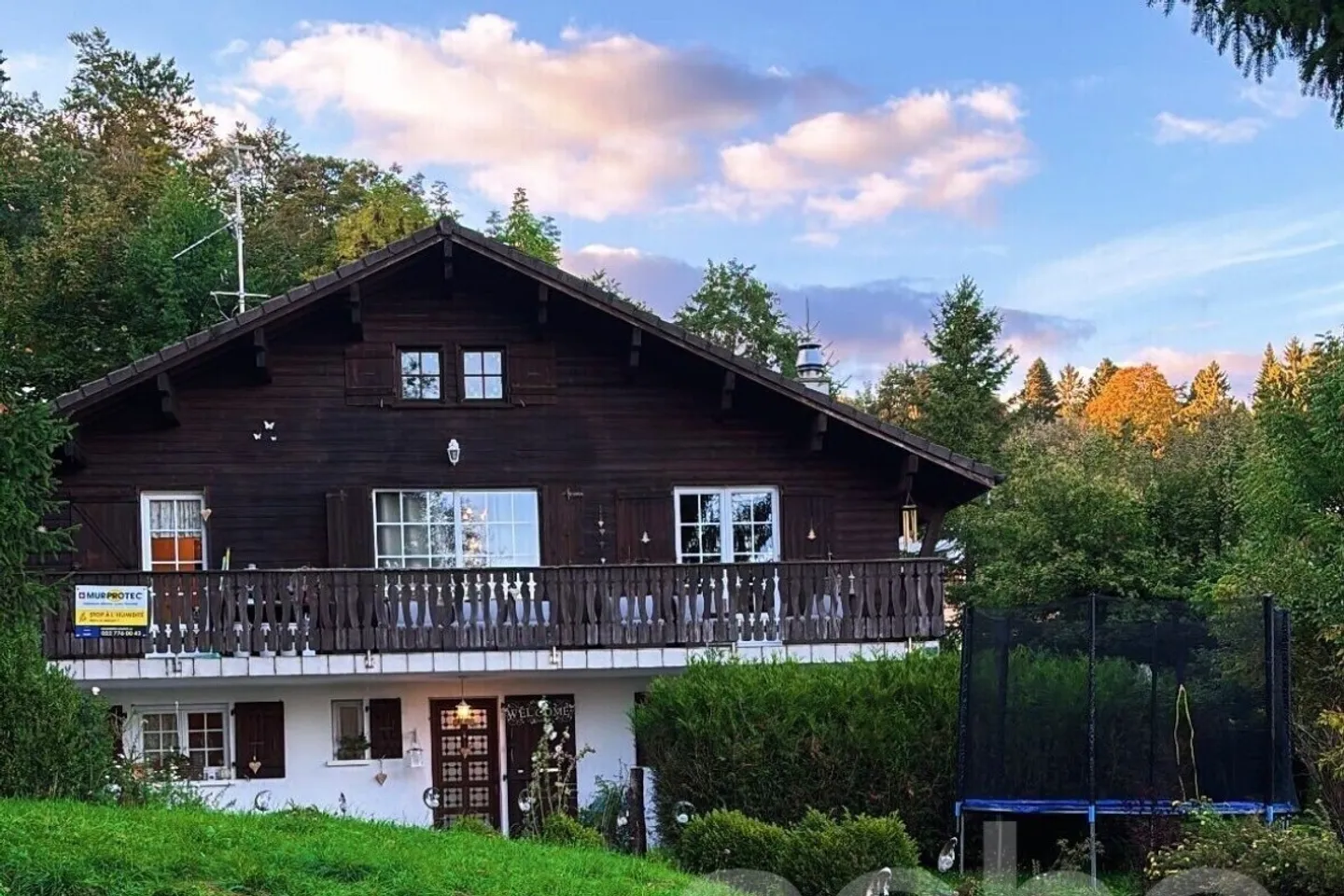 Familienchalet mit großem Garten - Foto 2 von 9