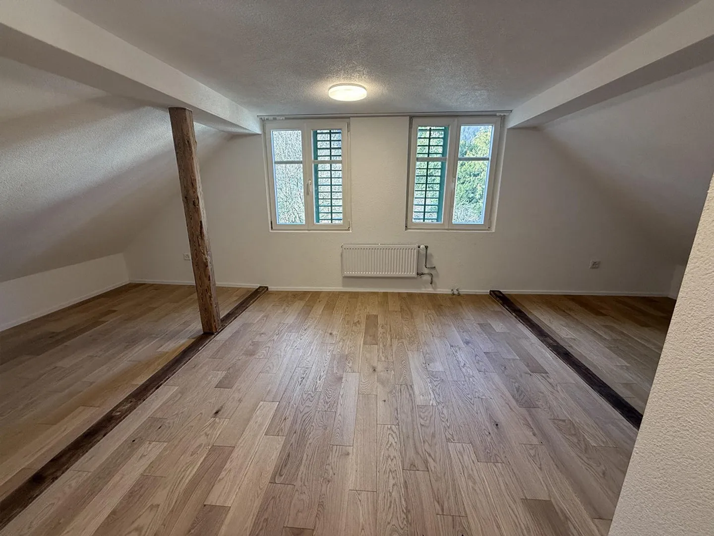 Appartement sous les combles lumineux et récemment rénové de 2,5 pièces à Flums – CHF 1'550 tout compris - Photo 8 sur 9