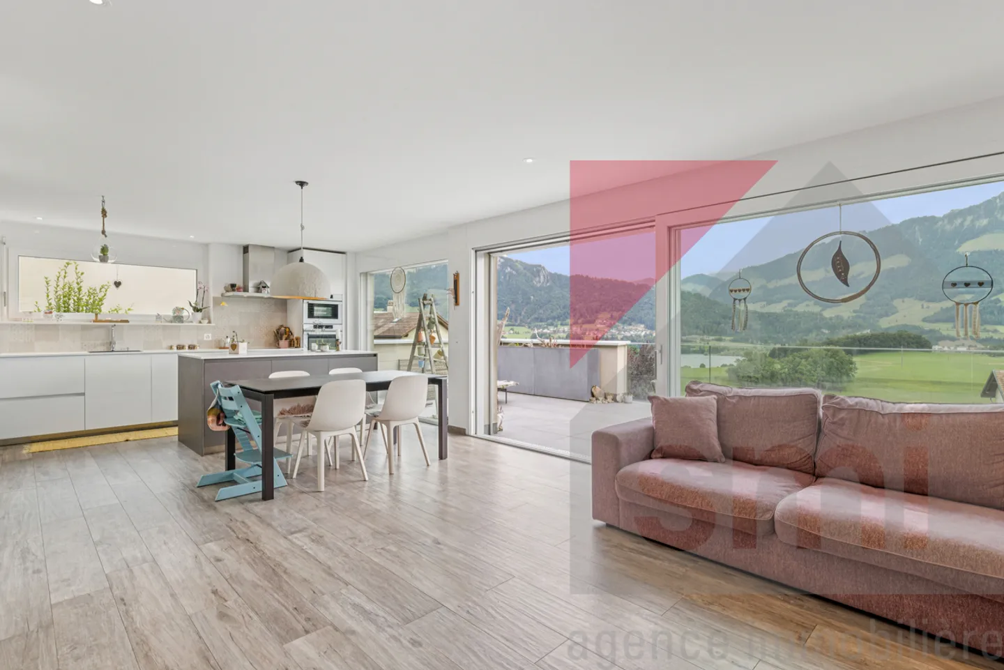 Magnifique appartement avec terrasse et vue sur le lac et les Préalpes - Photo 3 sur 13