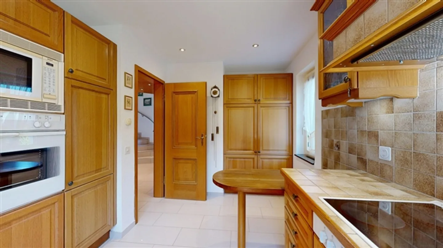 Maison individuelle de 4,5 pièces avec garage - Photo 15 sur 20