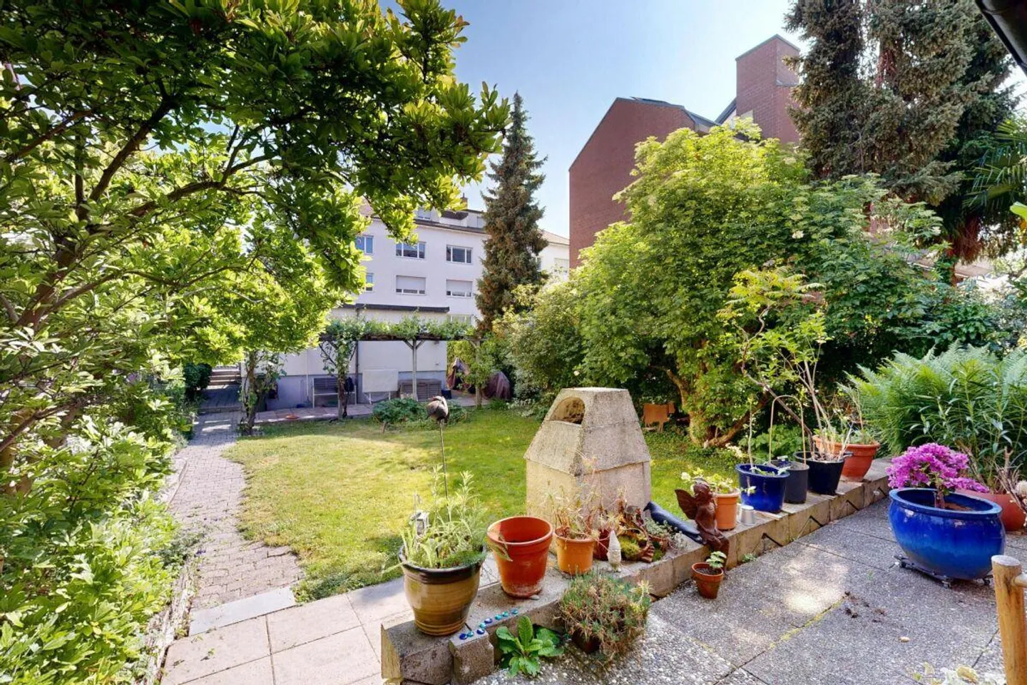 Vollvermietetes Mehrfamilienhaus mit 3 Wohnungen und 2 Garagen - Foto 7 von 30