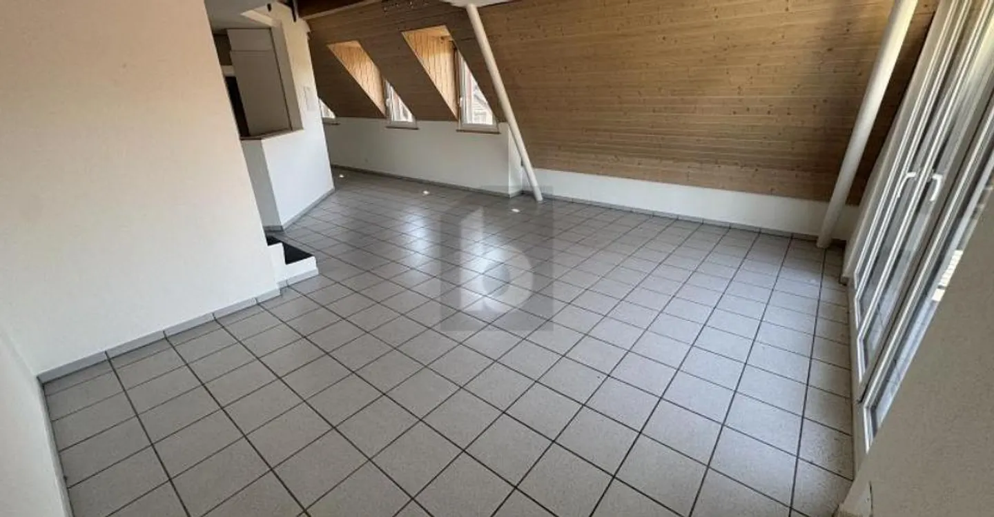 LIGHT-FLOODED WITH SPACIOUS FLOOR PLAN! - Photo 2 of 3