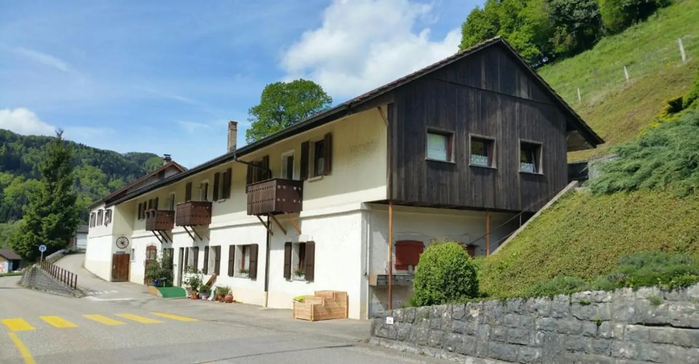 3,5-Zimmer-Wohnung im 1. Stock zur Miete in St-Ursanne - Foto 1 von 11
