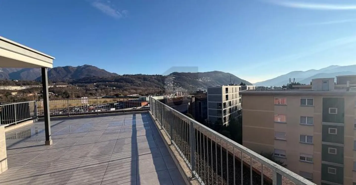 LARGE TERRACE WITH LAKE VIEW - Photo 1 of 5