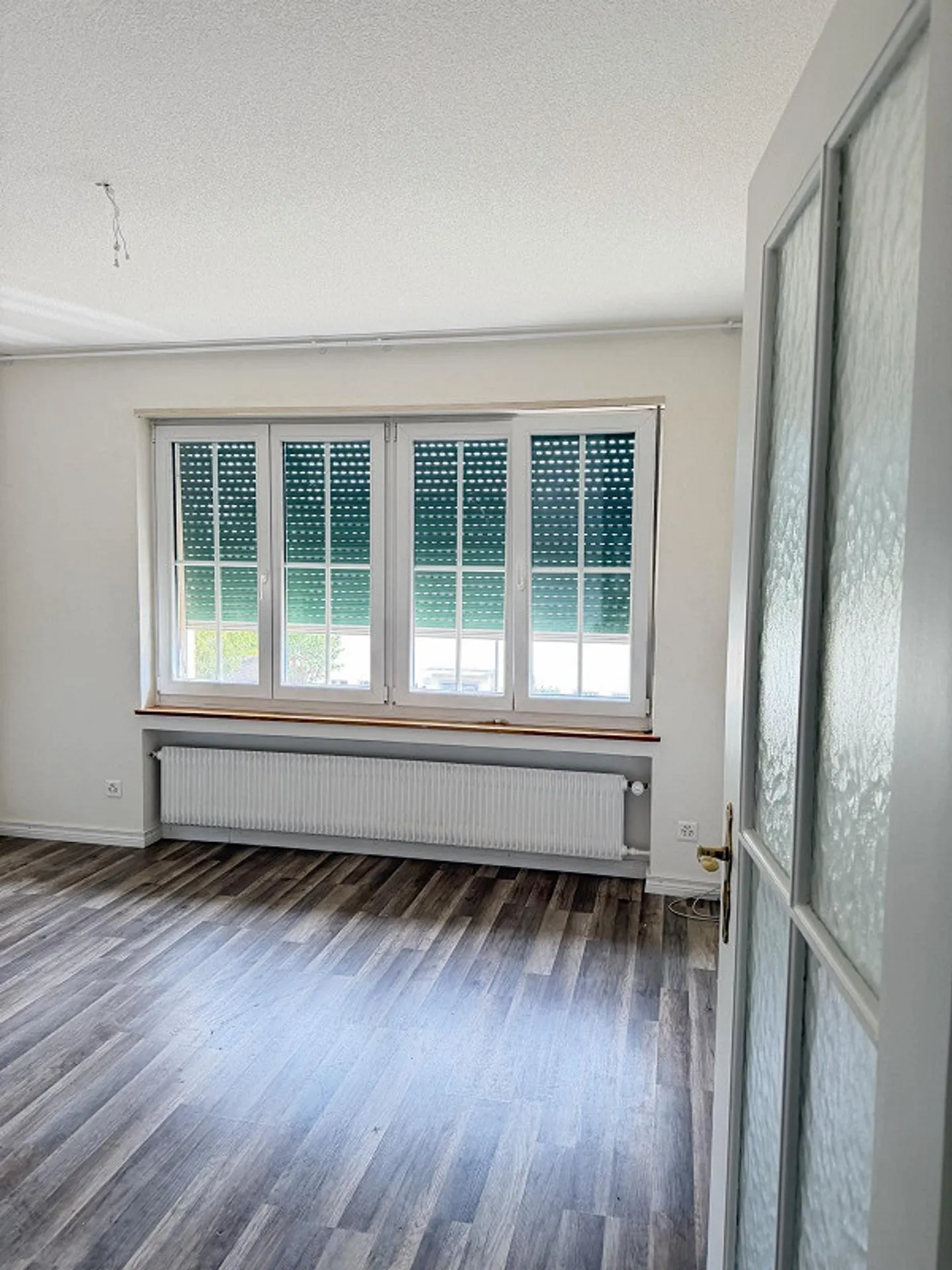 Renovierte Wohnung mit Garten - Foto 1 von 12