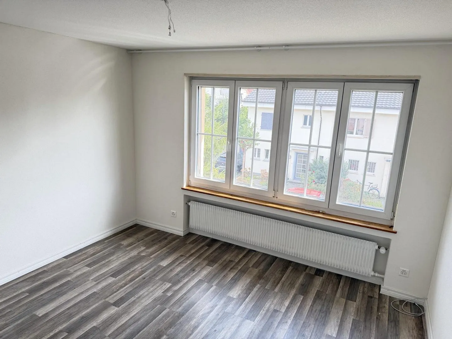 Renovierte Wohnung mit Garten - Foto 2 von 12
