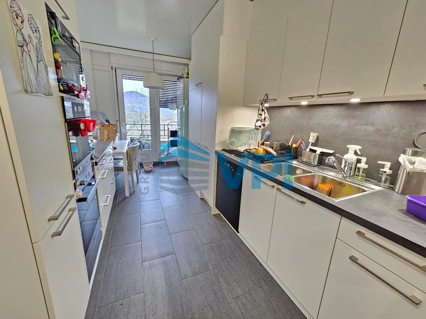 Geräumige Wohnung mit Balkonen - Foto 7 von 8