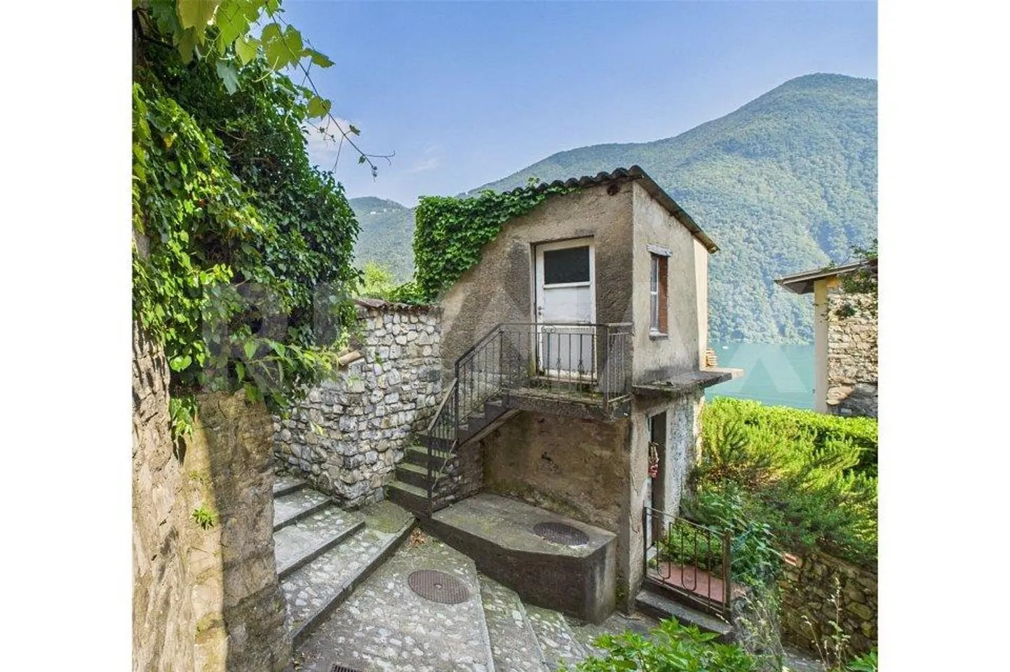 Oggetto di ristrutturazione: Casa e Rustico a Gandria con una magnifica vista sul lago! - Foto 10 di 11