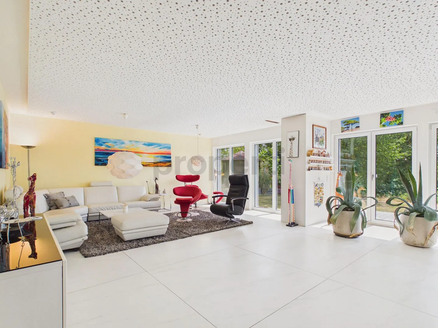 Unobstructed view into the greenery, Minergie standard and large terraced garden - Photo 2 of 14