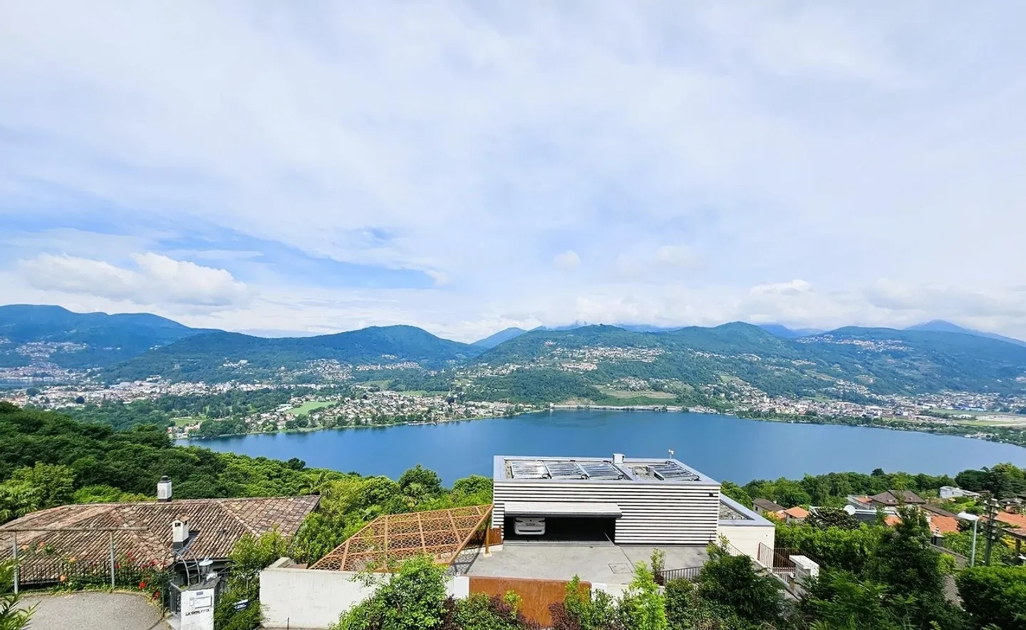 Baugrundstück mit atemberaubendem Blick auf den Luganersee – Montagnola und genehmigtes Projekt für eine 10-Zimmer-Villa - Foto 7 von 9