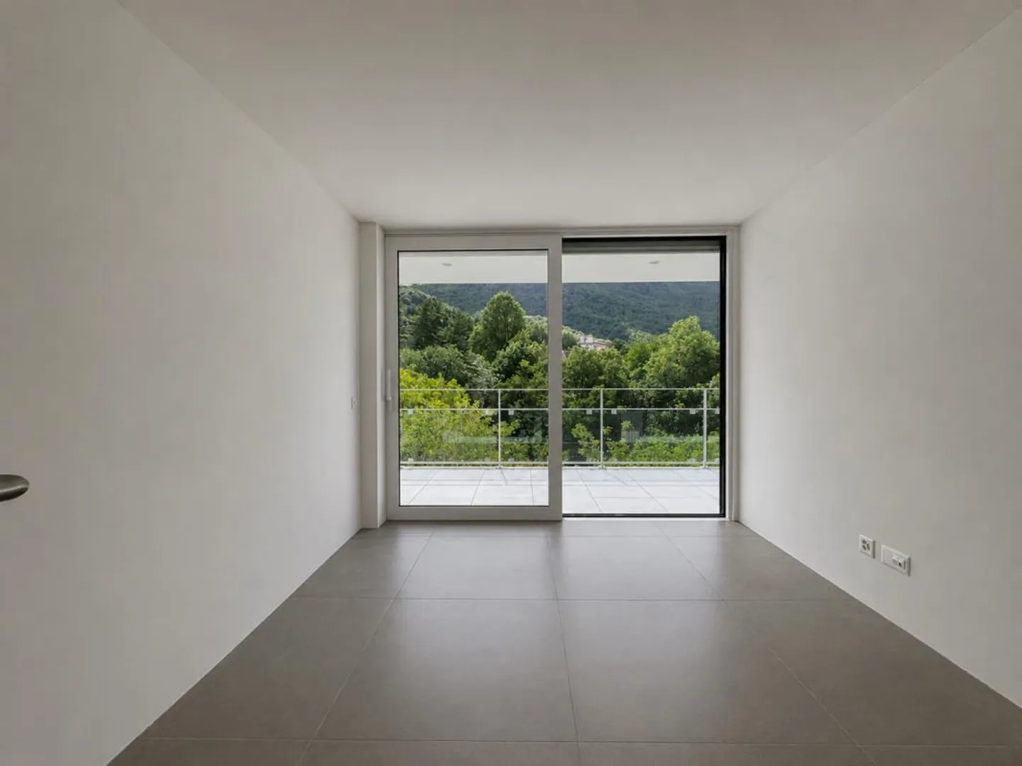 Wohnung mit Terrasse und herrlichem Blick auf Lugano und die Berge - Foto 3 von 4