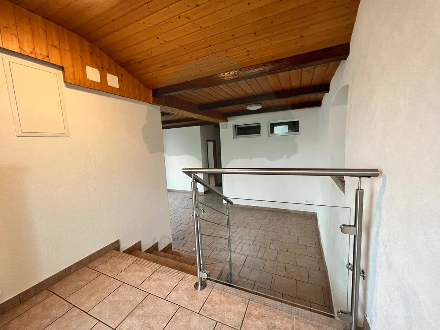 Lot of two 3.5-room apartments and a studio with garage - Photo 1 of 11