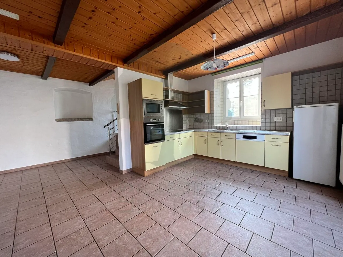 Lot of two 3.5-room apartments and a studio with garage - Photo 4 of 11