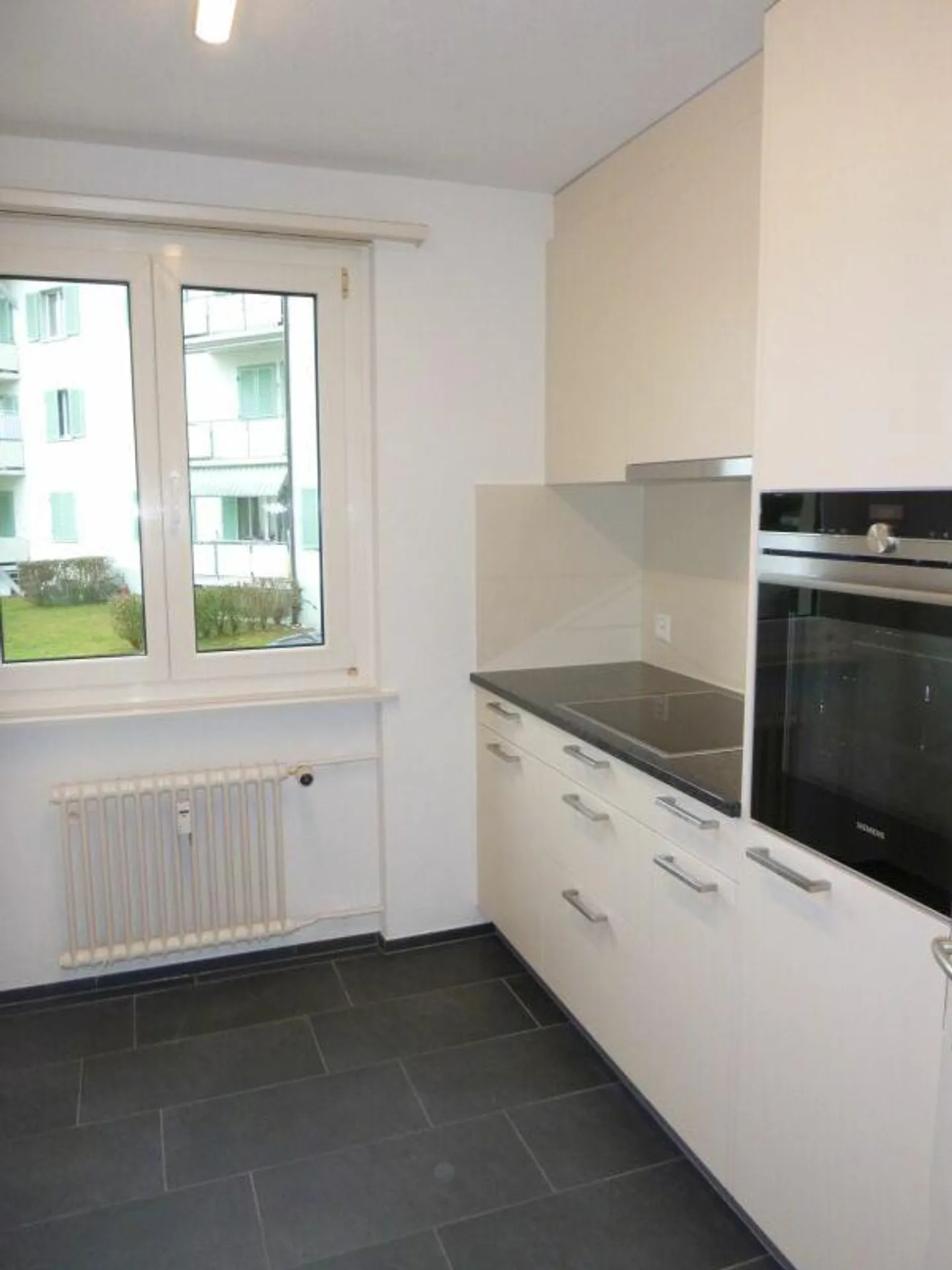 Helle Wohnung mit Garten - Foto 2 von 10