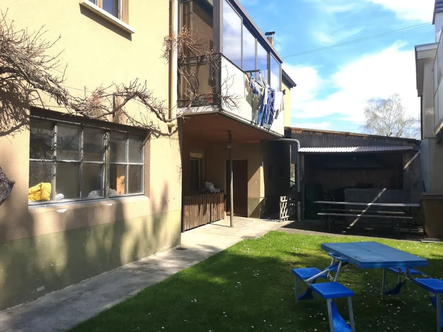 Maison à 2 appartements avec véranda, jardin, garage : rénovations à prévoir - Photo 6 sur 13