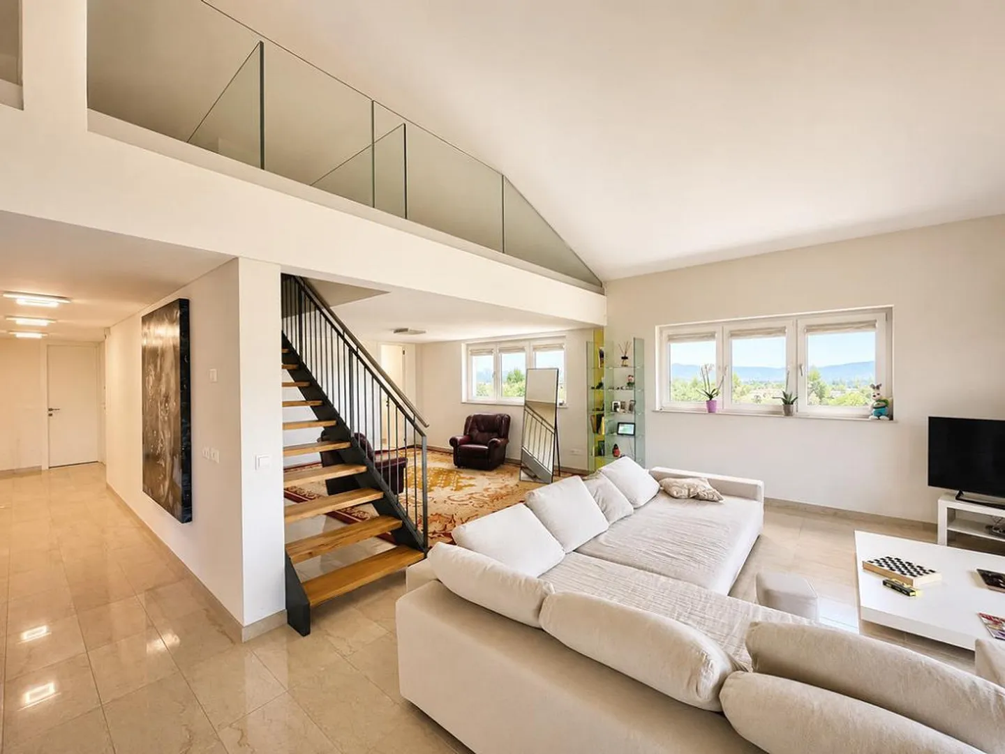 MONTAGNOLA - EXCLUSIVE DUPLEX FOR SALE 5.5 ROOMS WITH LAKE VIEW - Photo 3 of 13