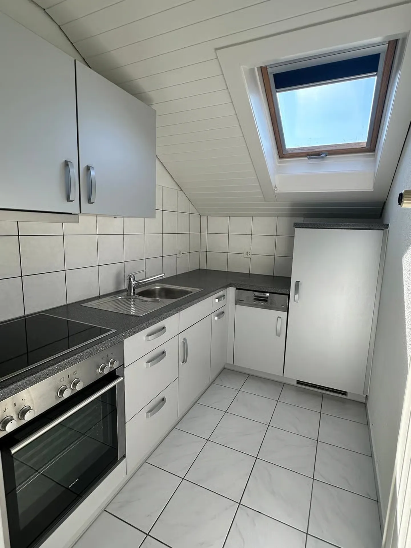 Geräumige Dachgeschosswohnung in Schwadernau - Foto 1 von 11