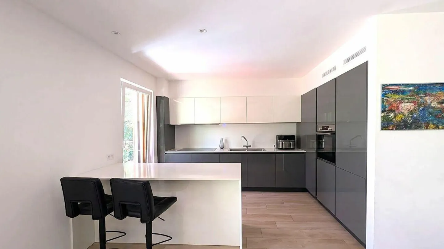 Appartement lumineux avec jardin et grande terrasse - Photo 6 sur 12