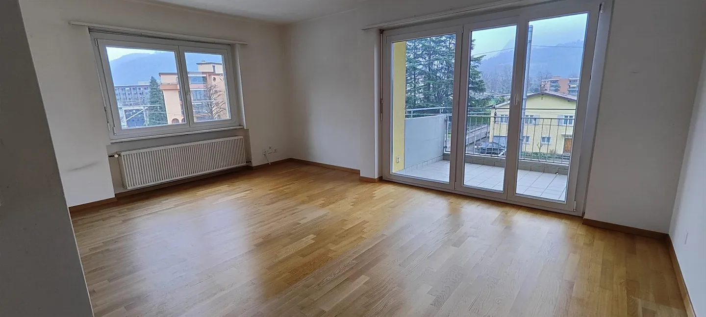 Bel appartement de 3,5 pièces avec vue panoramique à Agno - Photo 2 sur 7