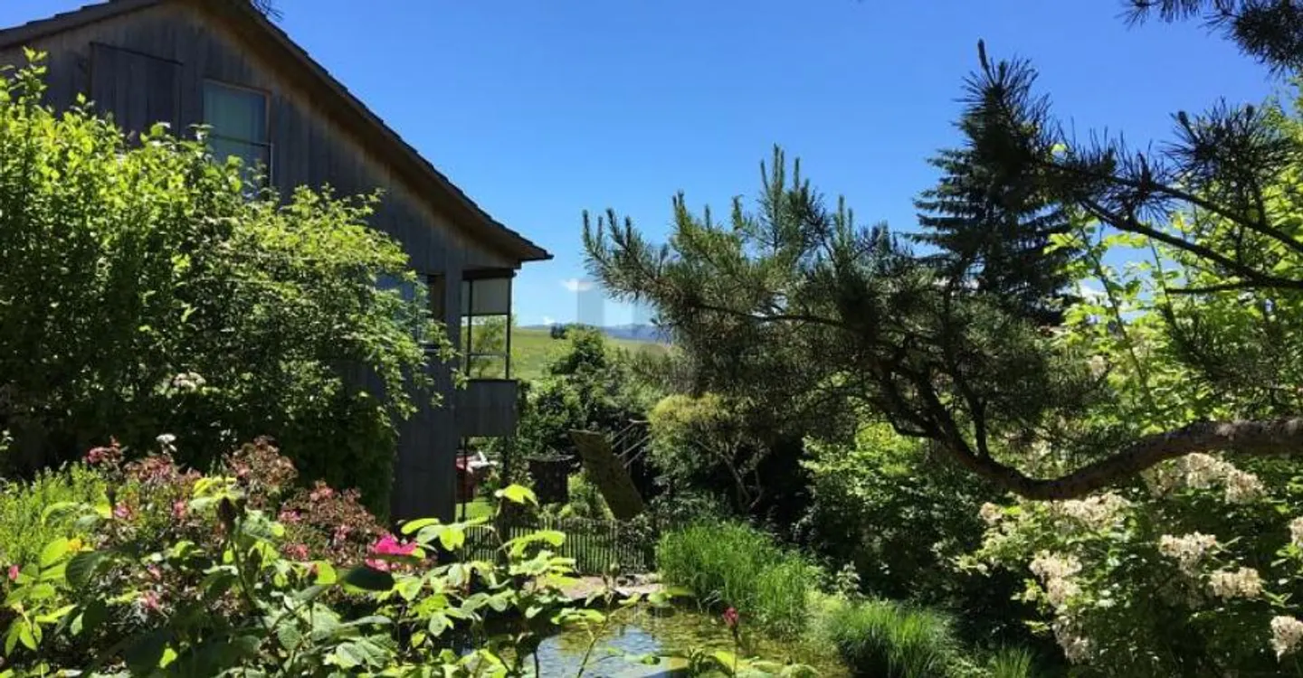 Exklusive Familienhaus mit Teich - Foto 1 von 4