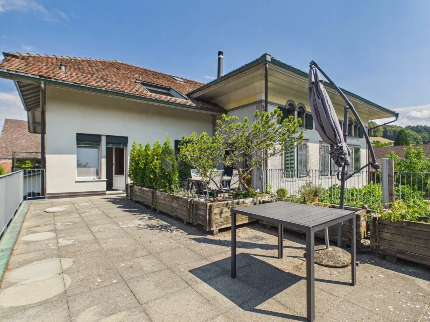 Charmante Wohnung mit Terrasse - Foto 1 von 8