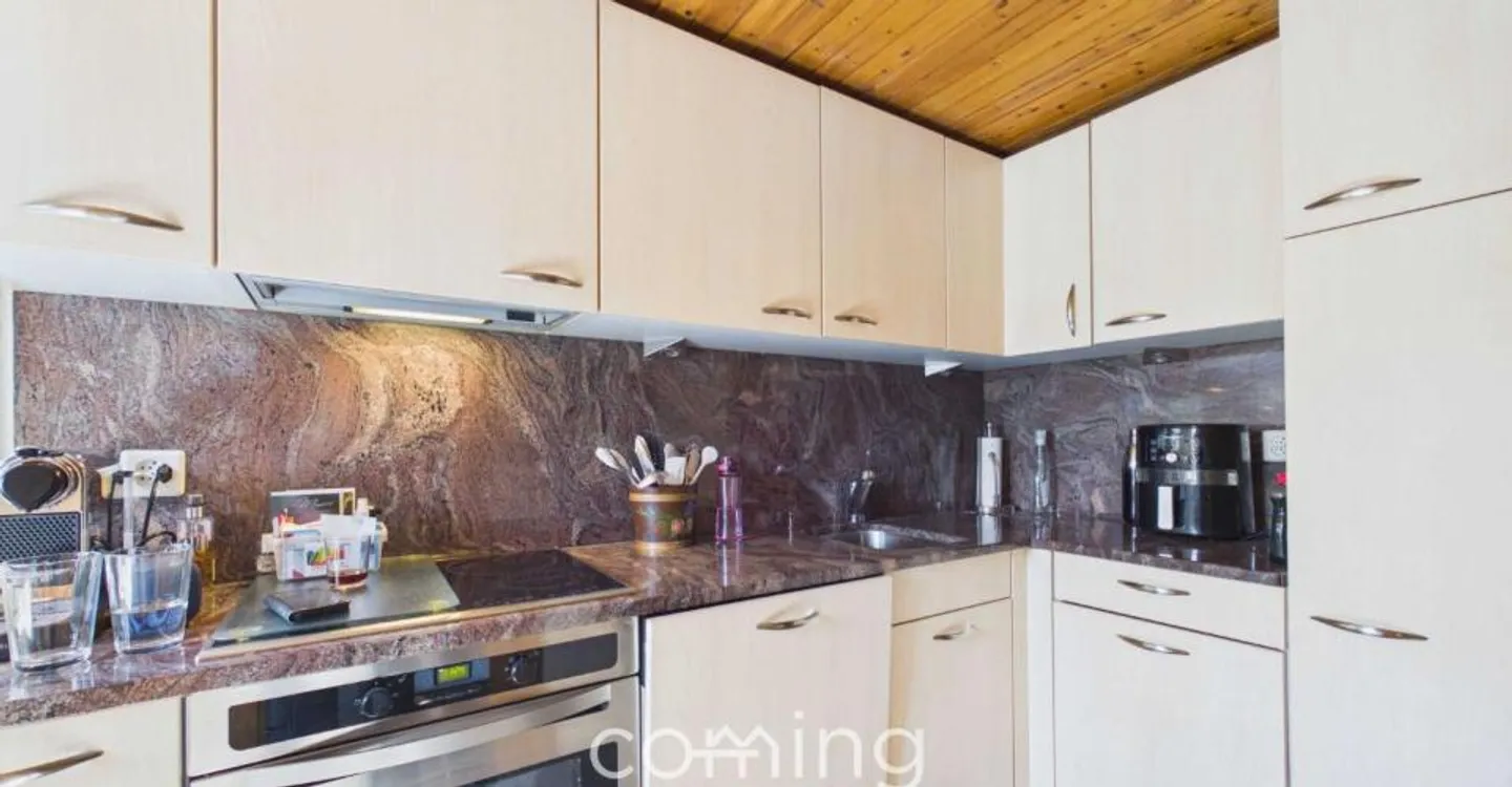 Charmantes Chalet mit Bauland - Foto 4 von 12