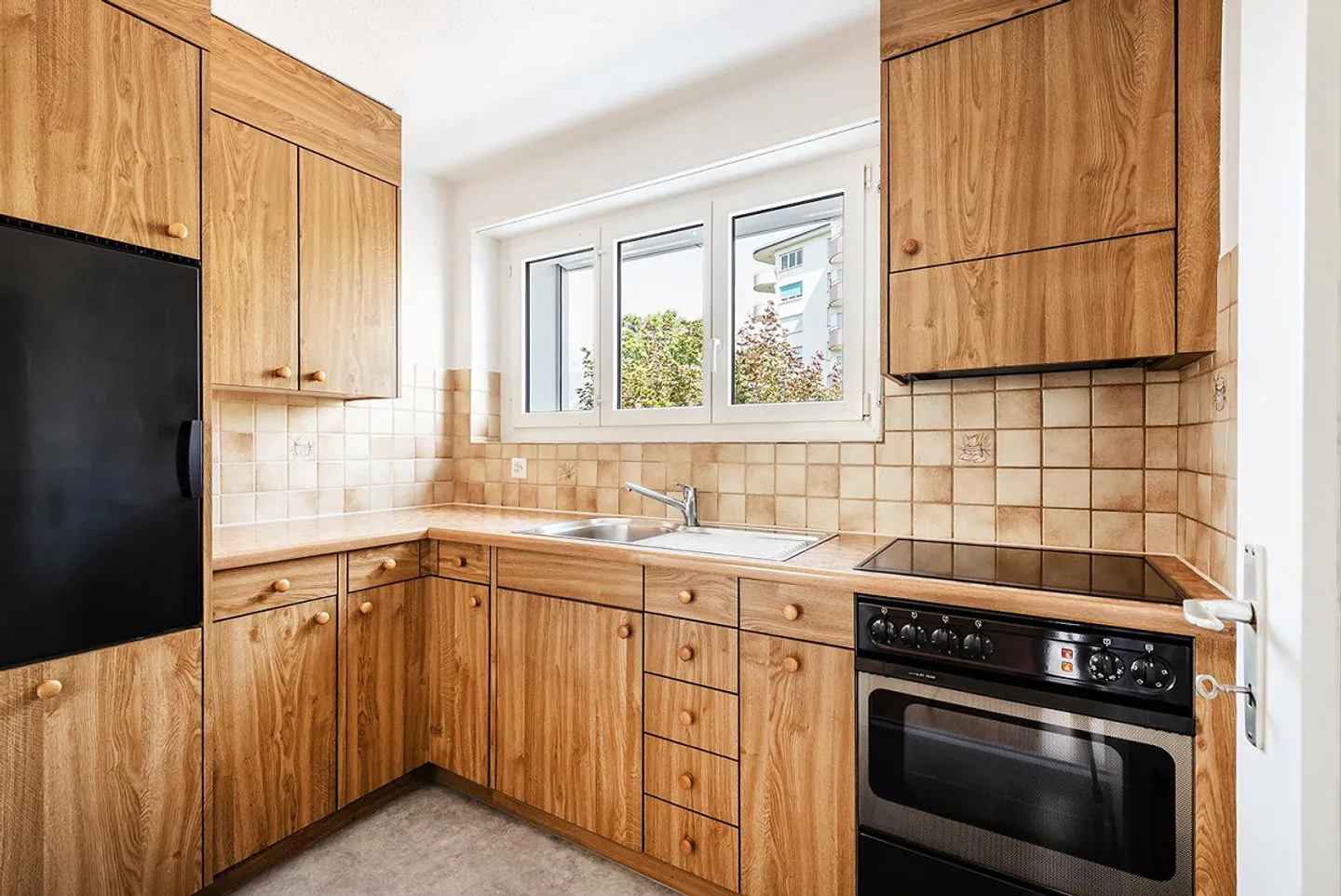 Votre nouvel espace familial : Appartement lumineux avec balcon dans la verdure - Photo 3 sur 9