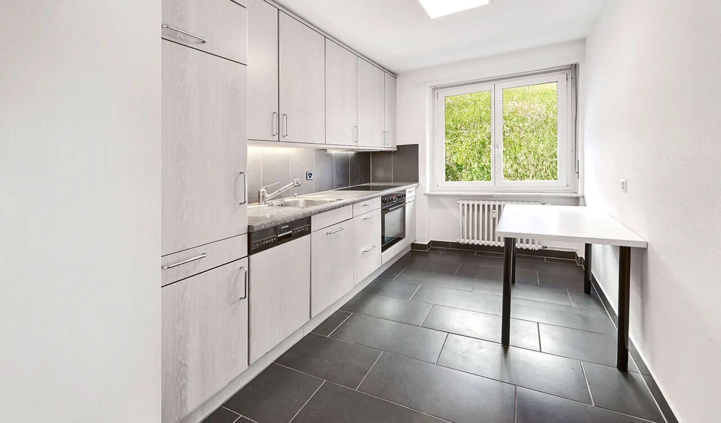 Vivre dans un emplacement privilégié en ville - Photo 4 sur 8