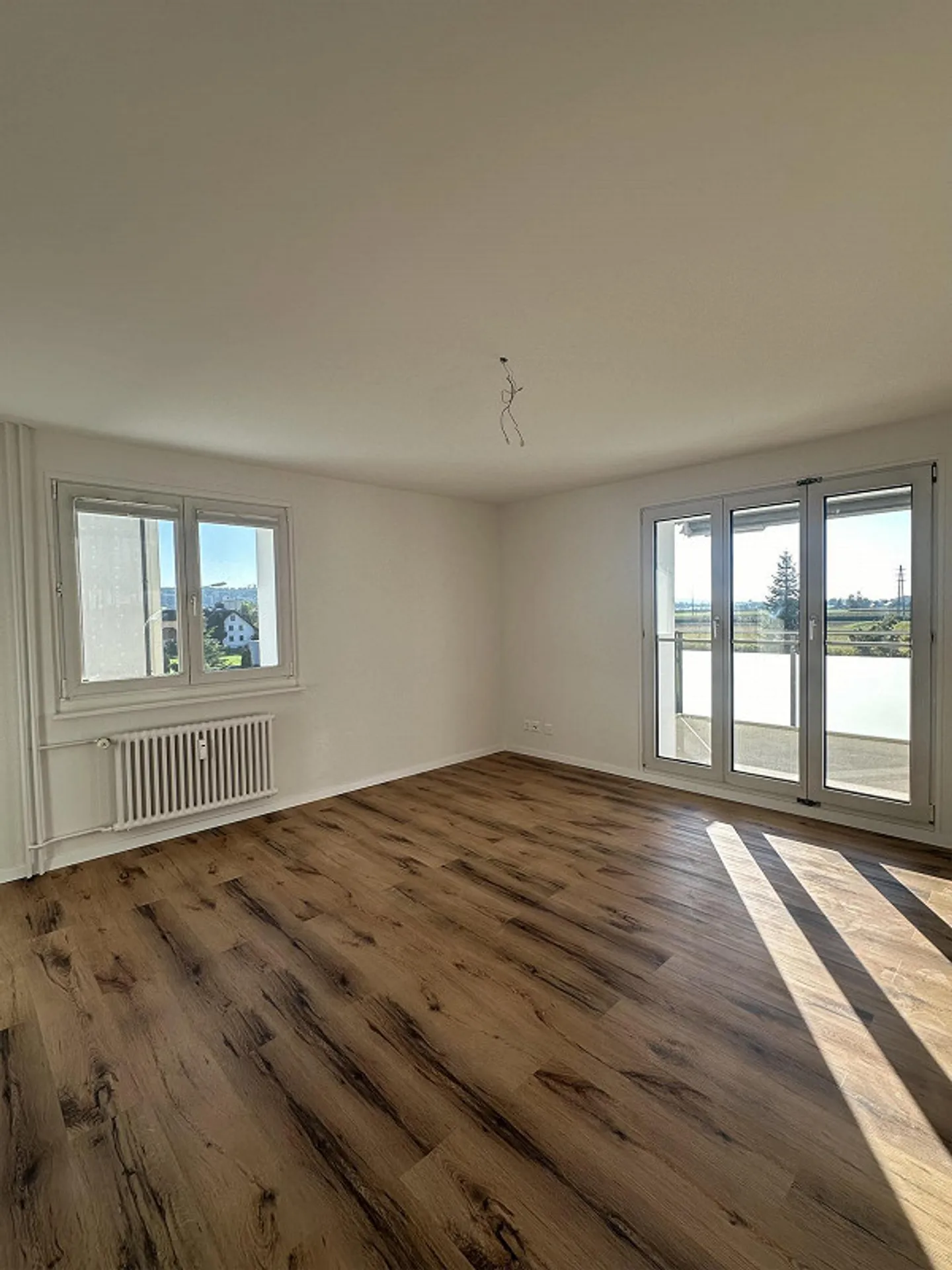 Appartamento moderno recentemente ristrutturato di 4,5 stanze con vista rurale - Foto 1 di 8