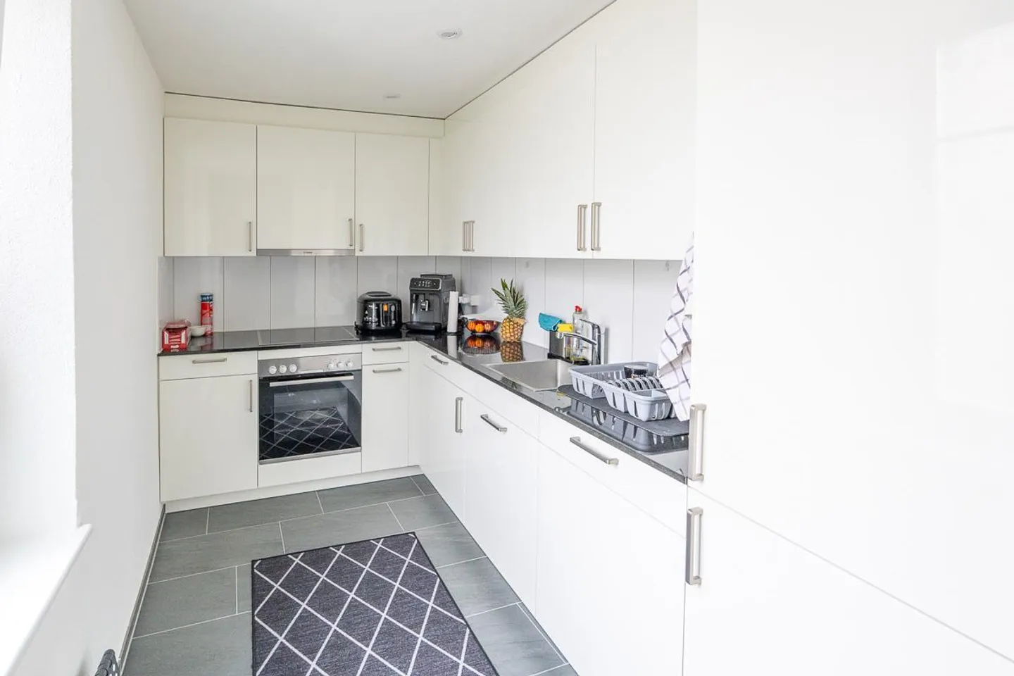 Maison multifamiliale avec espace commercial - directement à la gare de Rorschach Stadt - Photo 5 sur 10