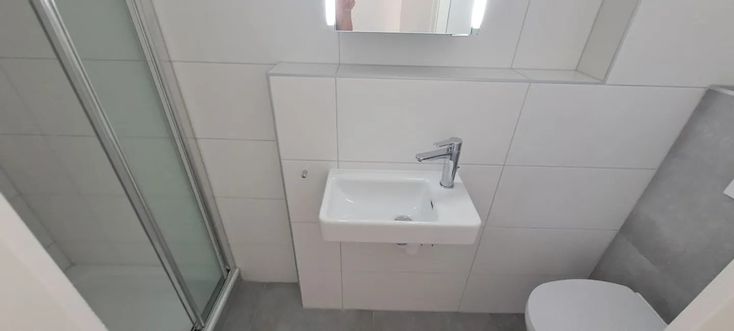 A louer au rez, un 4.5 pièces entièrement rénové - Photo 7 sur 8