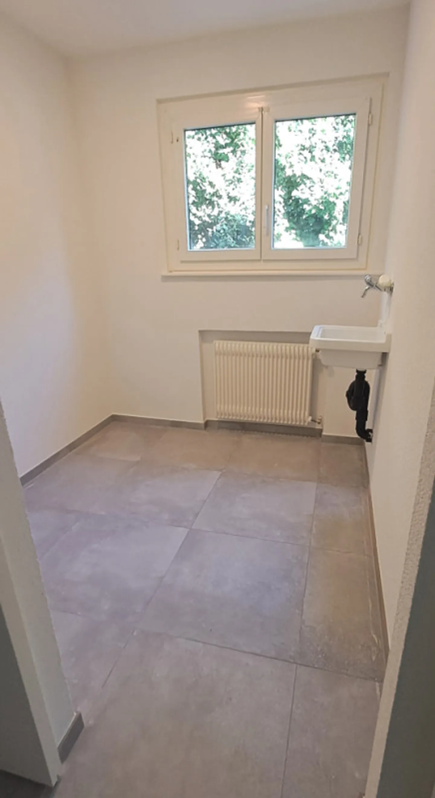 A louer au rez, un 4.5 pièces entièrement rénové - Photo 8 sur 8
