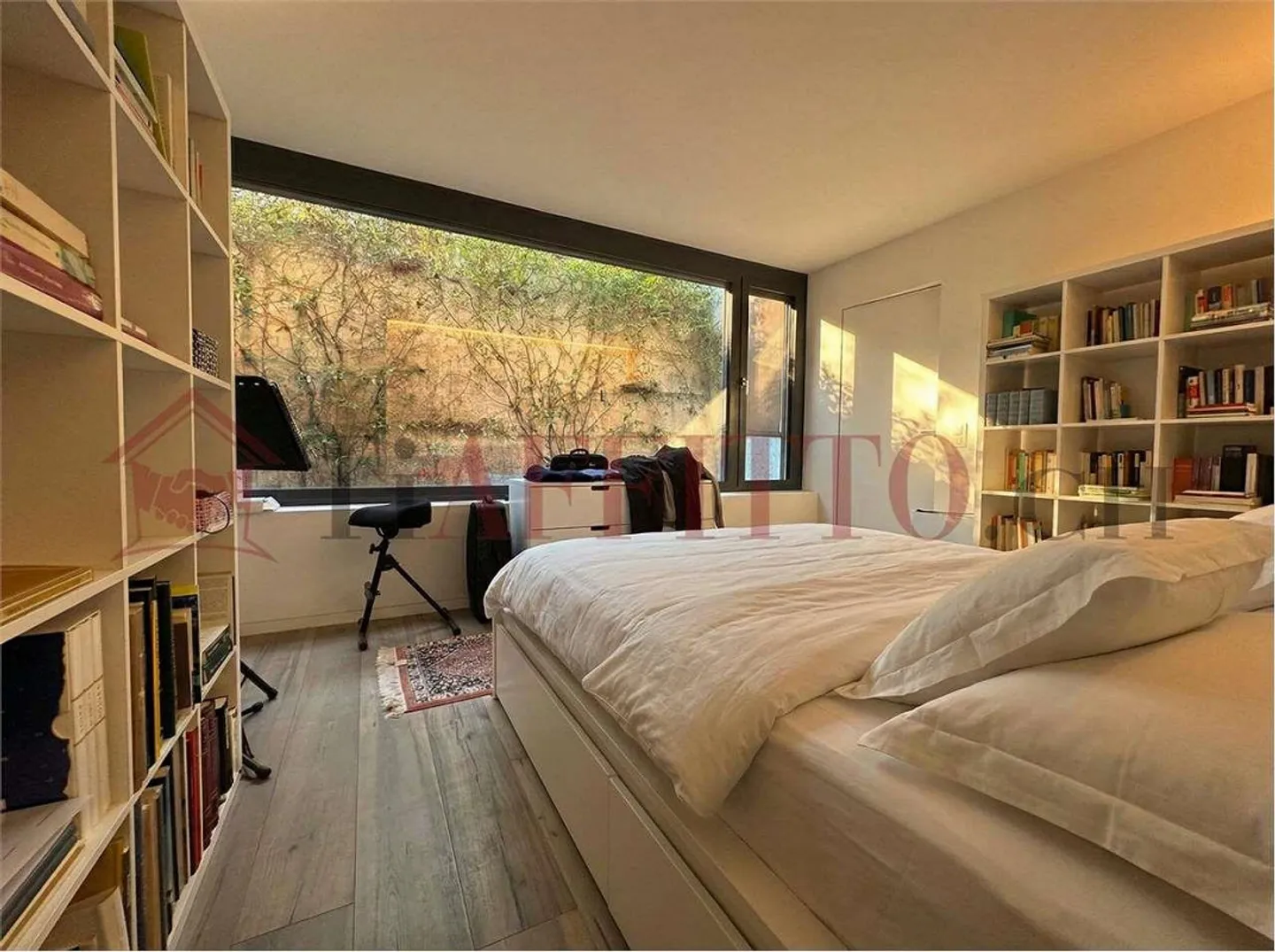 Moderna casa bifamiliare con giardino privato a Comano - Foto 8 di 12