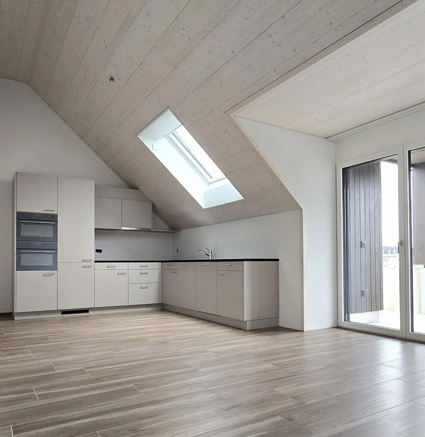 Attic apartment of a special kind - modern living with a feel-good character - Photo 4 of 7